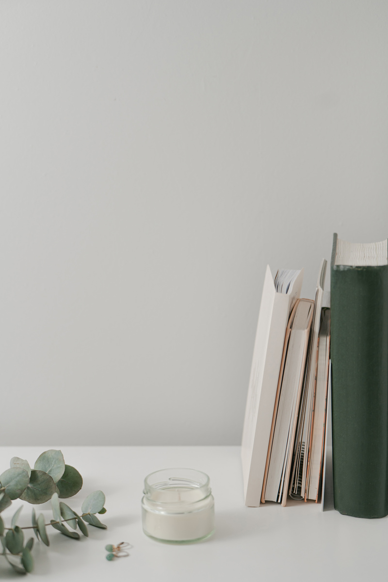Minimal desk with books and notebooks, aesthetic home office